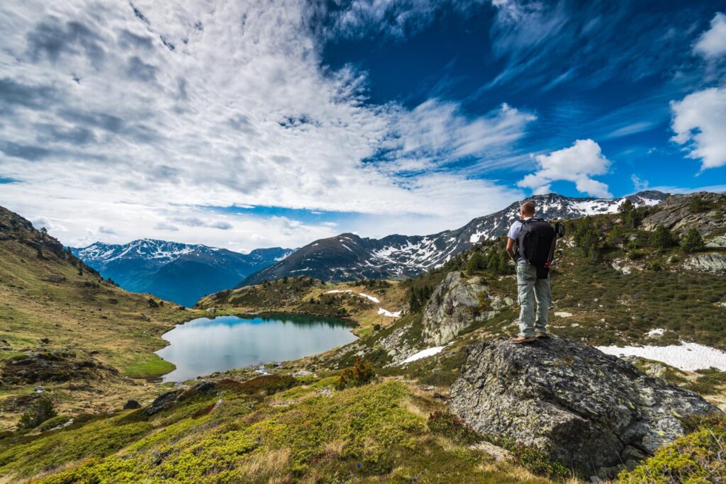 active hiker with backpack in pyrenees P4CQPGN compressed