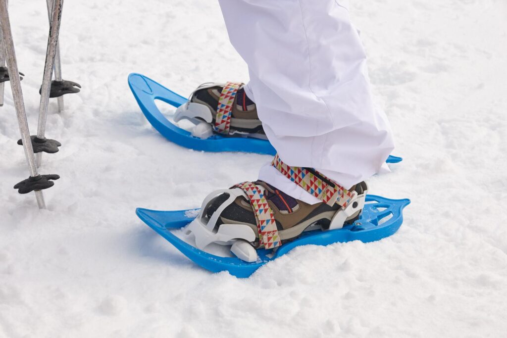 snow rackets and boots equipment on the snow winte RZJDES6 compressed